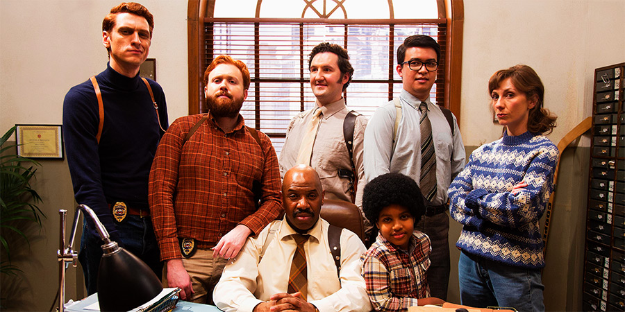 Top Coppers. Image shows left to right: John Mahogany (Steen Raskopoulos), Mitch Rust (John Kearns), Chief (Donovan Blackwood), Peterson (John Hollingworth), Zach (Rio Myers), McGockey (Phil Wang), Helga (Gabby Best) Top Coppers. Image shows left to right: John Mahogany (Steen Raskopoulos), Mitch Rust (John Kearns), Chief (Donovan Blackwood), Peterson (John Hollingworth), Zach (Rio Myers), McGockey (Phil Wang), Helga (Gabby Best)