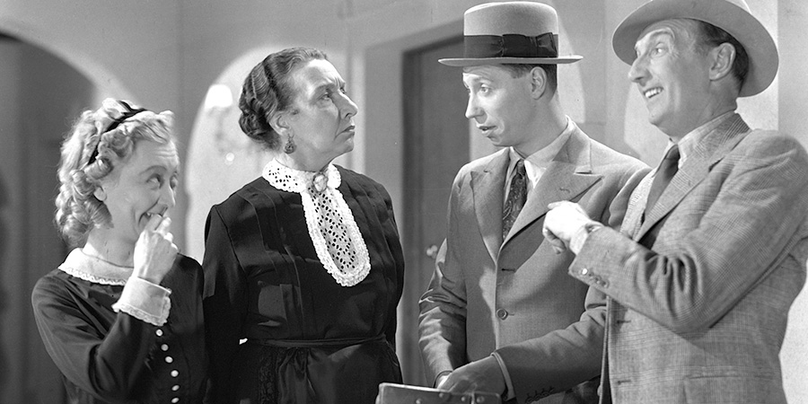 Trouble Brewing. Image shows left to right: Maid (Esma Cannon), Housekeeper (Beatrix Fielden-Kaye), George Gullip (George Formby), Bill Pike (Gus McNaughton). Credit: STUDIOCANAL