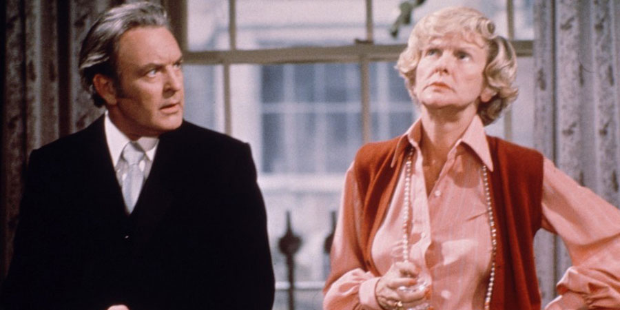 Two's Company. Image shows from L to R: Robert Hiller (Donald Sinden), Dorothy McNab (Elaine Stritch). Copyright: London Weekend Television