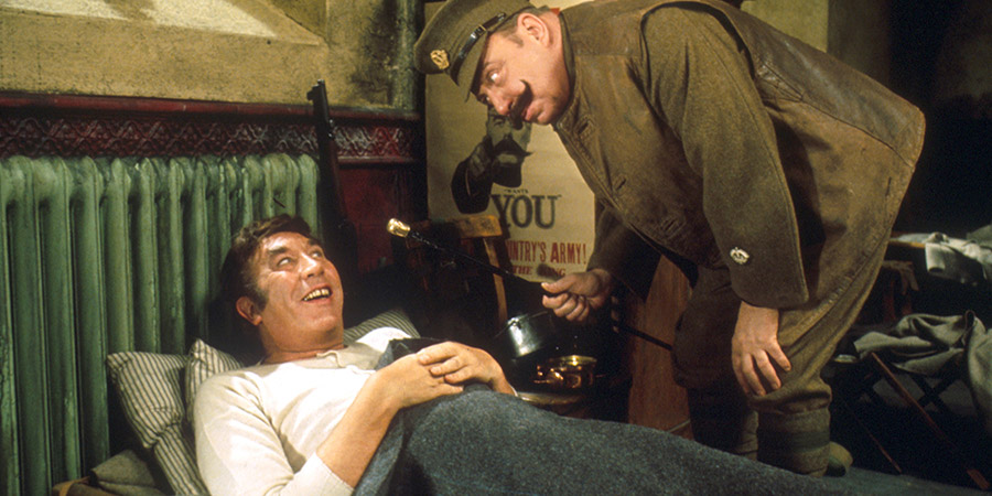 Up The Front. Image shows from L to R: Lurk (Frankie Howerd), Groping (Bill Fraser). Copyright: Associated London Films Limited / STUDIOCANAL