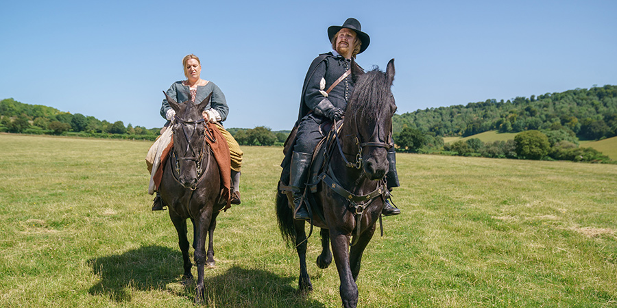 The Witchfinder. Image shows from L to R: Thomasine Gooch (Daisy May Cooper), Gideon Bannister (Tim Key)