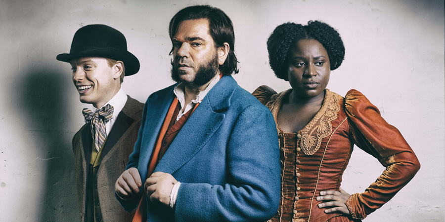 Year Of The Rabbit. Image shows from L to R: Wilbur Strauss (Freddie Fox), Detective Inspector Rabbit (Matt Berry), Mabel Wisbech (Susan Wokoma). Copyright: Objective Productions