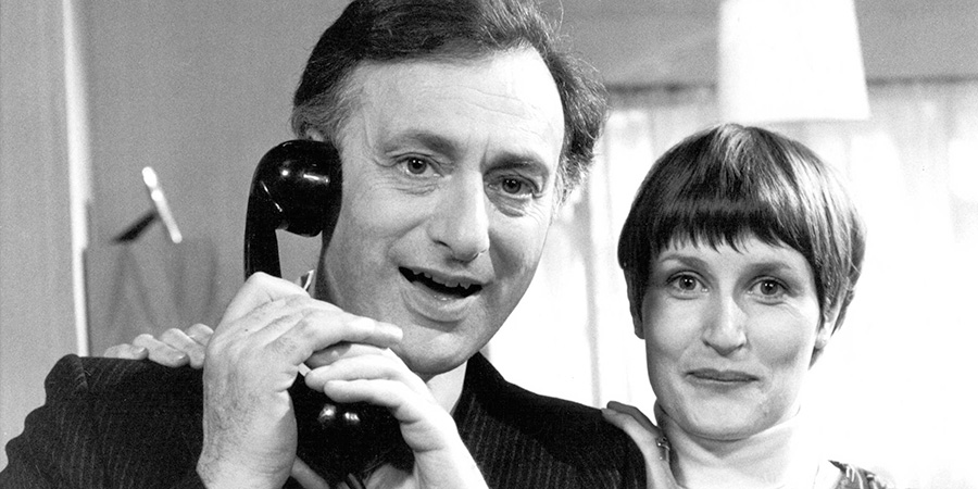 Yes Minister. Image shows left to right: James Hacker (Paul Eddington), Annie Hacker (Diana Hoddinott). Credit: BBC