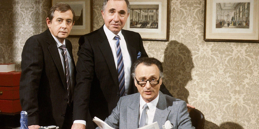 Yes Minister. Image shows from L to R: Bernard Woolley (Derek Fowlds), Sir Humphrey Appleby (Nigel Hawthorne), James Hacker (Paul Eddington). Copyright: BBC