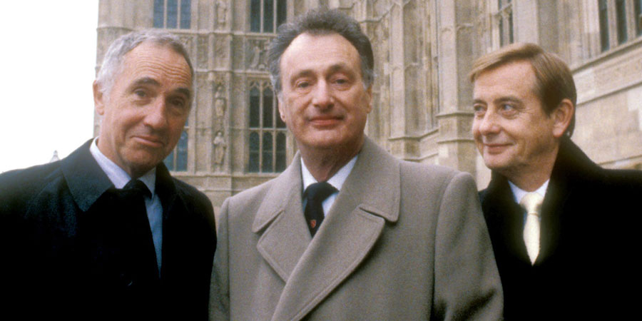 Yes, Prime Minister. Image shows from L to R: Sir Humphrey Appleby (Nigel Hawthorne), James Hacker (Paul Eddington), Bernard Woolley (Derek Fowlds). Copyright: BBC