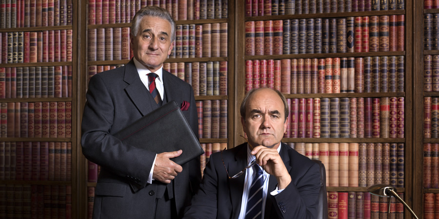 Yes, Prime Minister. Image shows from L to R: Sir Humphrey Appleby (Henry Goodman), Jim Hacker (David Haig). Copyright: BBC