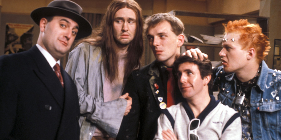 The Young Ones. Image shows from L to R: Balowski Family (Alexei Sayle), Neil (Nigel Planer), Rick (Rik Mayall), Mike (Christopher Ryan), Vyvyan (Adrian Edmondson). Copyright: BBC