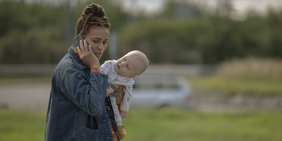 The Baby. Image shows from L to R: Natasha (Michelle De Swarte), The Baby (Albie Pascal Hills), The Baby (Arthur Levi Hills)