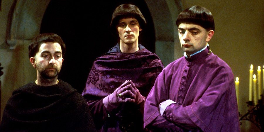 Blackadder. Image shows left to right: Baldrick (Tony Robinson), Percy (Tim McInnerny), Edmund, Duke of Edinburgh (Rowan Atkinson). Credit: BBC