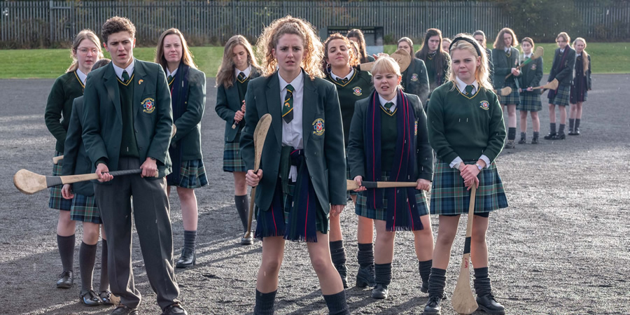 Derry Girls. Image shows from L to R: James Maguire (Dylan Llewellyn), Orla McCool (Louisa Harland), Michelle Mallon (Jamie-Lee O'Donnell), Clare Devlin (Nicola Coughlan), Erin Quinn (Saoirse-Monica Jackson). Copyright: Hat Trick Productions