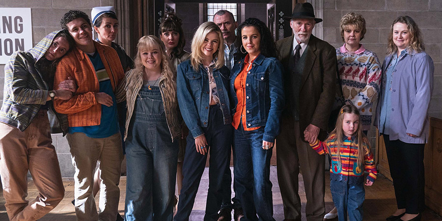 Derry Girls. Image shows from L to R: Orla McCool (Louisa Harland), James Maguire (Dylan Llewellyn), Deirdre Mallon (Amelia Crowley), Clare Devlin (Nicola Coughlan), Aunt Sarah (Kathy Kiera Clarke), Erin Quinn (Saoirse-Monica Jackson), Da Gerry (Tommy Tiernan), Michelle Mallon (Jamie-Lee O'Donnell), Granda Joe (Ian McElhinney), Ma Mary (Tara Lynne O'Neill), Geraldine Devlin (Philippa Dunne). Copyright: Hat Trick Productions