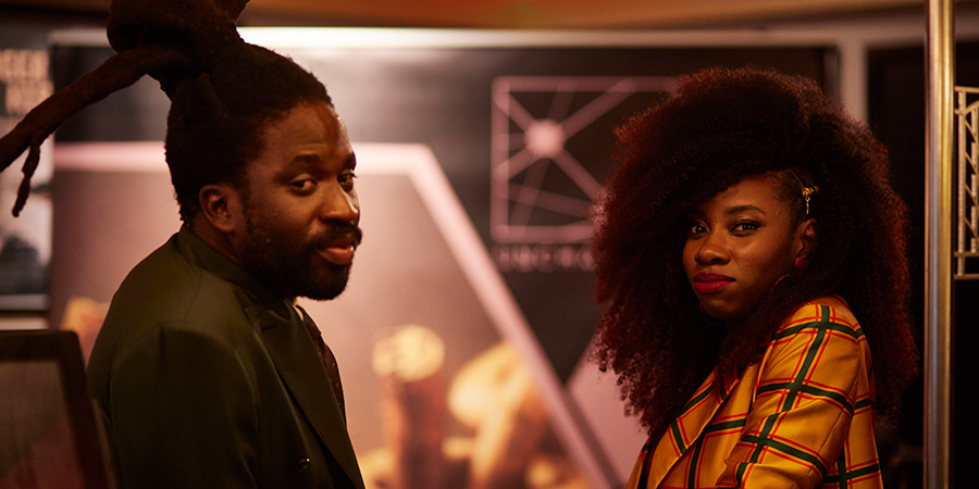 Dreaming Whilst Black. Image shows left to right: Kwabena (Adjani Salmon), Amy (Dani Moseley). Credit: BBC, Big Deal Films