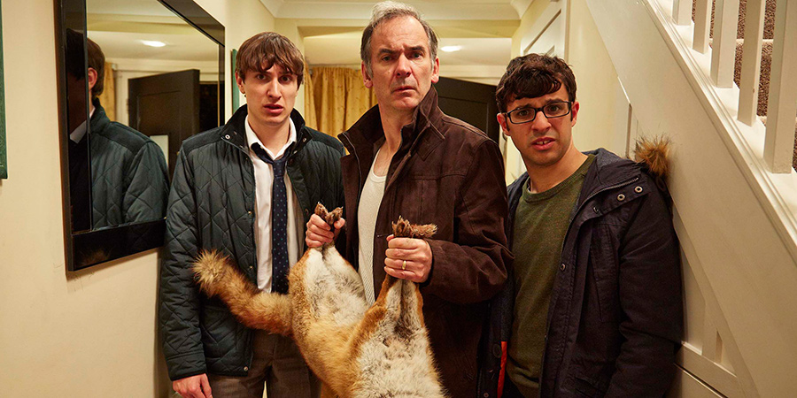 Friday Night Dinner. Image shows from L to R: Jonny (Tom Rosenthal), Martin (Paul Ritter), Adam (Simon Bird)