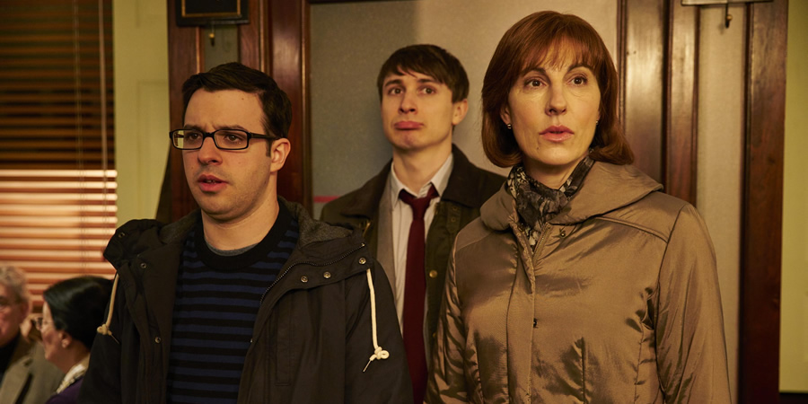 Friday Night Dinner. Image shows from L to R: Adam (Simon Bird), Jonny (Tom Rosenthal), Jackie (Tamsin Greig)