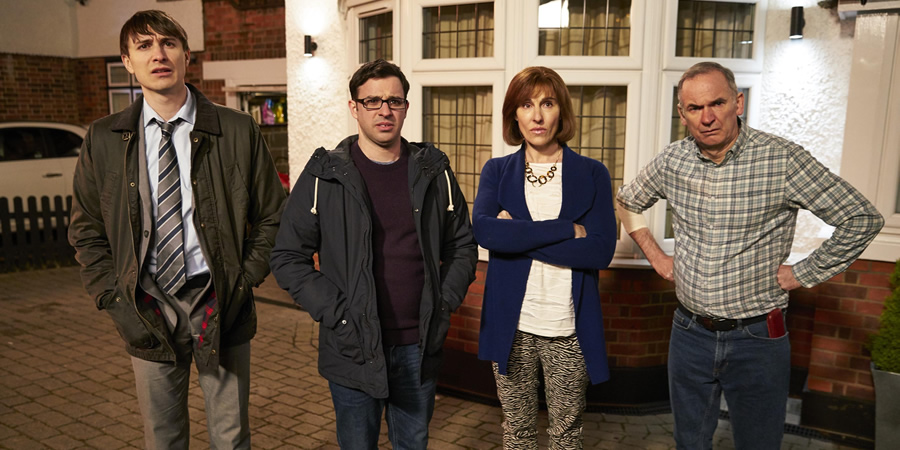 Friday Night Dinner. Image shows from L to R: Jonny (Tom Rosenthal), Adam (Simon Bird), Jackie (Tamsin Greig), Martin (Paul Ritter)