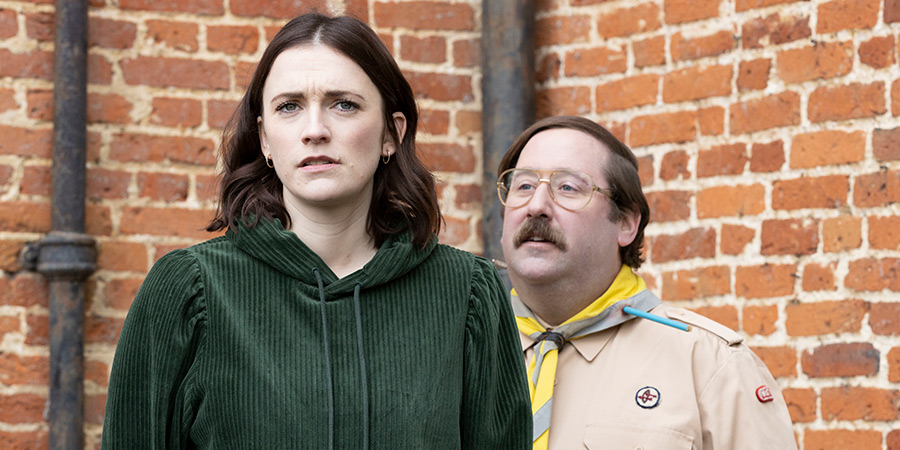 Ghosts. Image shows left to right: Alison (Charlotte Ritchie), Pat (Jim Howick)