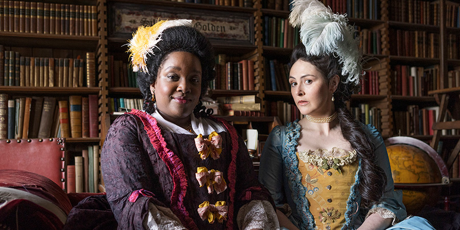 Ghosts. Image shows left to right: Kitty (Lolly Adefope), Eleanor (Emma Sidi)