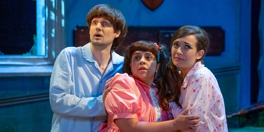 The Goes Wrong Show. Image shows from L to R: Chris (Henry Shields), Annie (Nancy Zamit), Vanessa (Bryony Corrigan)