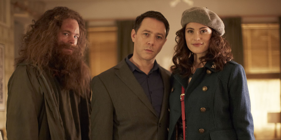 Inside No. 9. Image shows from L to R: Migg (Steve Pemberton), Tom (Reece Shearsmith), Gerri (Gemma Arterton). Copyright: BBC