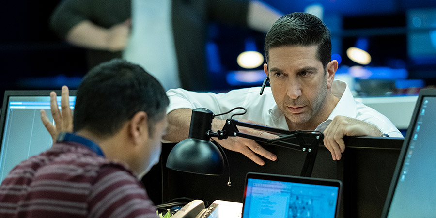 Intelligence. Image shows from L to R: Joseph Harries (Nick Mohammed), Jerry Bernstein (David Schwimmer)