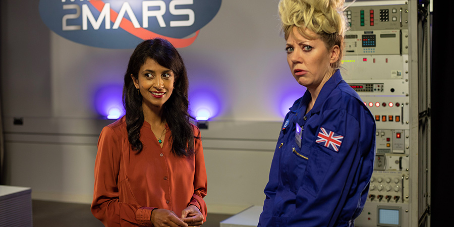 Mandy. Image shows from L to R: Konnie Huq, Mandy (Diane Morgan)