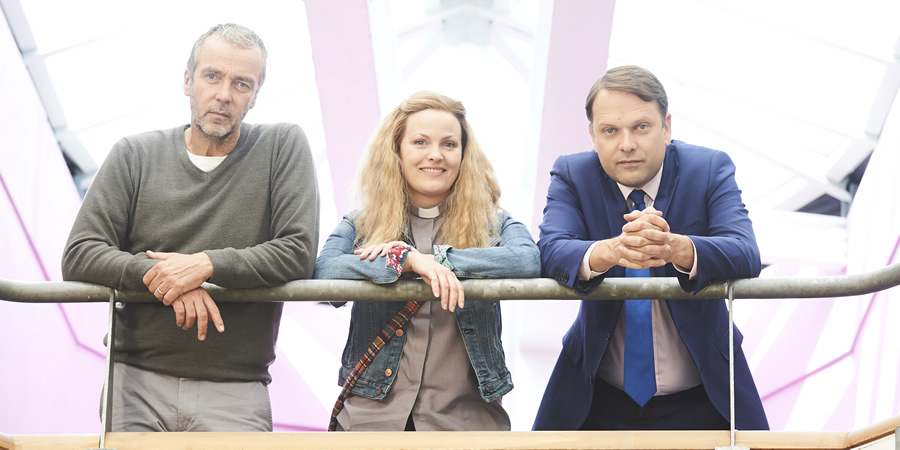 Marley's Ghosts. Image shows from L to R: Adam Wise (John Hannah), Vicar (Jo Joyner), Michael Walton (Nicholas Burns)