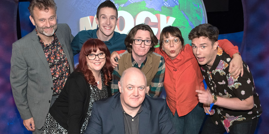 Mock The Week. Image shows from L to R: Hugh Dennis, Angela Barnes, Larry Dean, Dara O Briain, Ed Byrne, Kerry Godliman, Ed Gamble. Copyright: Angst Productions