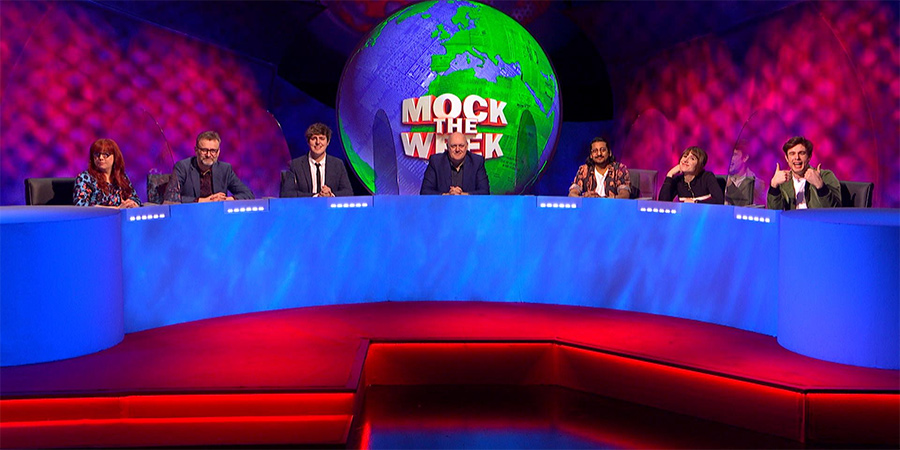 Mock The Week. Image shows from L to R: Angela Barnes, Hugh Dennis, Glenn Moore, Dara O Briain, Ahir Shah, Maisie Adam, Ed Gamble. Copyright: Angst Productions