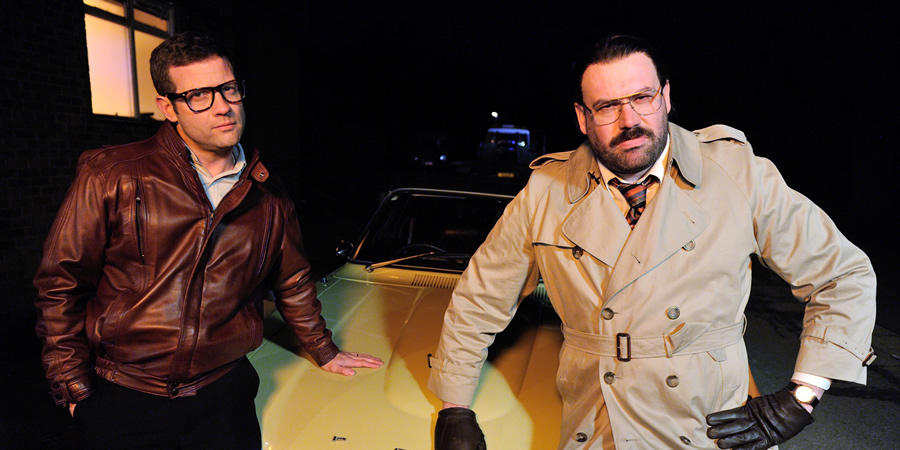 Murder In Successville. Image shows from L to R: Dermot O'Leary, DI Sleet (Tom Davis). Copyright: Tiger Aspect Productions