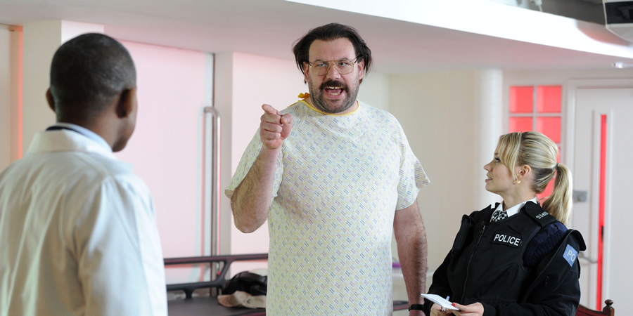 Murder In Successville. Image shows from L to R: Dr Obama (Jason Lewis), DI Sleet (Tom Davis), Kimberly Wyatt. Copyright: Tiger Aspect Productions