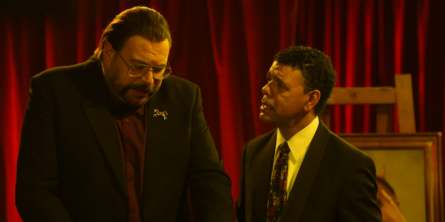 Murder In Successville. Image shows from L to R: DI Sleet (Tom Davis), Chris Kamara. Copyright: Tiger Aspect Productions