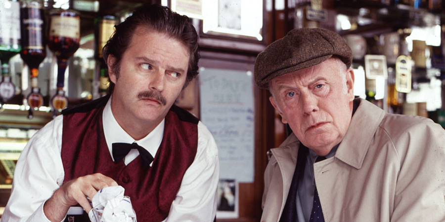 One Foot In The Grave. Image shows left to right: Barman (Paul Merton), Victor Meldrew (Richard Wilson) One Foot In The Grave. Image shows left to right: Barman (Paul Merton), Victor Meldrew (Richard Wilson)