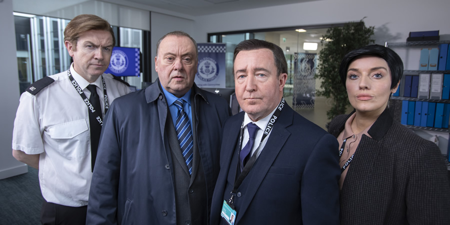 Mark Cox as a senior uniformed officer, Alex Norton as Taggart's DI Burke, Jonathan Watson as Line of Duty's DS Steve Arnott, Joy McAvoy as Line of Duty's DI Kate Fleming. Image shows from L to R: Mark Cox, Alex Norton, Jonathan Watson, Joy McAvoy