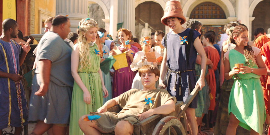 Plebs. Image shows from L to R: Diana (Rachel Parris), Grumio (Ryan Sampson), Marcus (Tom Rosenthal). Copyright: RISE Films