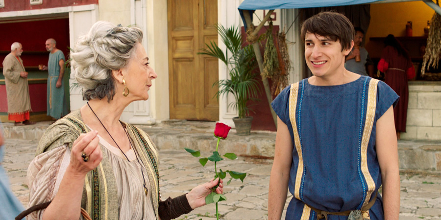 Plebs. Image shows from L to R: Landlady (Maureen Lipman), Marcus (Tom Rosenthal). Copyright: RISE Films