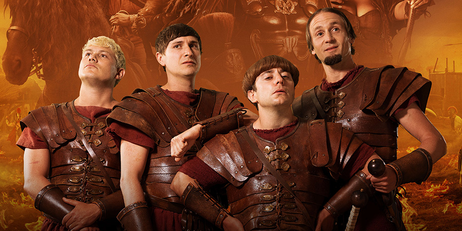 Plebs. Image shows left to right: Jason (Jon Pointing), Marcus (Tom Rosenthal), Grumio (Ryan Sampson), Aurelius (Tom Basden). Credit: RISE Films