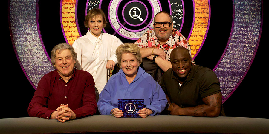 QI. Image shows left to right: Alan Davies, Holly Walsh, Sandi Toksvig, Justin Moorhouse, Emmanuel Sonubi