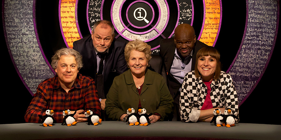 QI. Image shows left to right: Alan Davies, Jack Dee, Sandi Toksvig, Daliso Chaponda, Maisie Adam