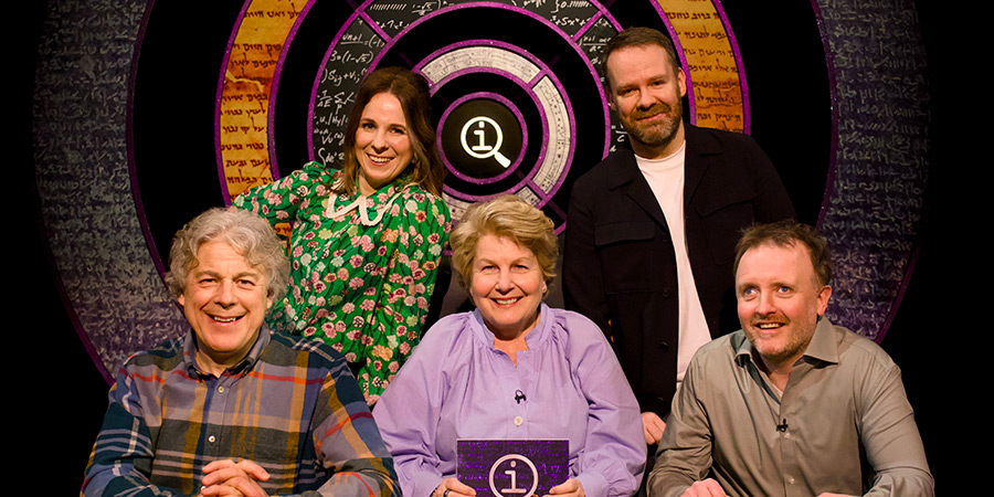 QI. Image shows left to right: Alan Davies, Cariad Lloyd, Sandi Toksvig, Neil Delamere, Chris McCausland