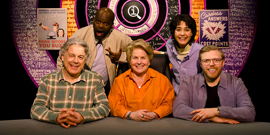 QI. Image shows left to right: Alan Davies, Daliso Chaponda, Sandi Toksvig, Lara Ricote, Rob Beckett