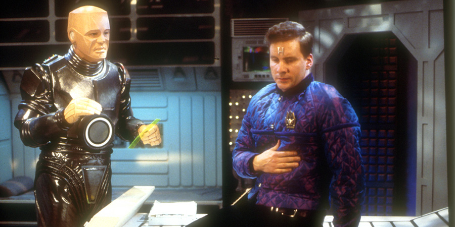 Red Dwarf. Image shows left to right: Kryten (Robert Llewellyn), Rimmer (Chris Barrie)