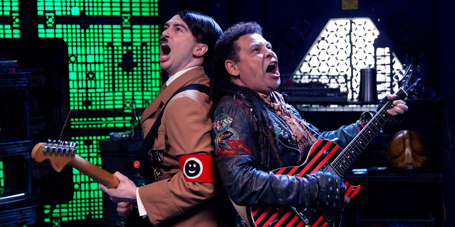 Red Dwarf. Image shows from L to R: Hitler (Ryan Gage), Lister (Craig Charles)