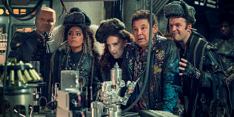 Red Dwarf. Image shows from L to R: Kryten (Robert Llewellyn), Sister Luna (Mandeep Dhillon), Sister Peanut (Lucy Pearman), Lister (Craig Charles), Brother Sol (Tom Bennett)