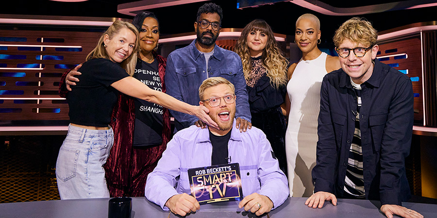 Rob Beckett's Smart TV. Image shows left to right: Anna Maxwell Martin, Alison Hammond, Romesh Ranganathan, Rob Beckett, Natasia Demetriou, Cush Jumbo, Josh Widdicombe