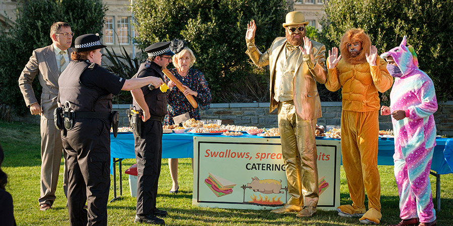 Sandylands. Image shows from L to R: Derek Swallows (David Walliams), Trudy Wright (Bronwyn James), Nathan Wild (Simon Bird), Jeannie Swallows (Sophie Thompson), Gold Statue (Daniel Hoffmann-Gill), Lion (Adam Loxley), Les Vegas (Sanjeev Bhaskar). Copyright: King Bert Productions