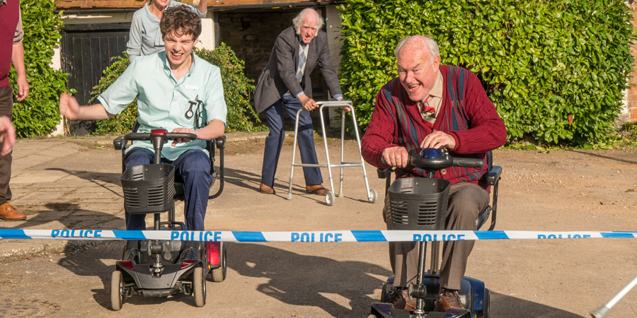 Shakespeare & Hathaway - Private Investigators. Image shows from L to R: Sebastian Brudenell (Patrick Walshe McBride), Johnny Falstaff (Timothy West). Copyright: BBC