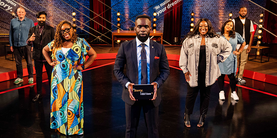 Sorry, I Didn't Know. Image shows from L to R: Miles Jupp, Paul Chowdhry, Chizzy Akudolu, Jimmy Akingbola, Judi Love, Sukh Ojla, Tom Moutchi. Copyright: Triforce Productions