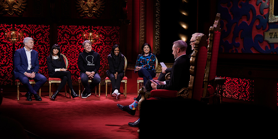 Taskmaster. Image shows from L to R: Adrian Chiles, Claudia Winkleman, Alan Davies, Lady Leshurr, Sayeeda Warsi, Alex Horne, Greg Davies