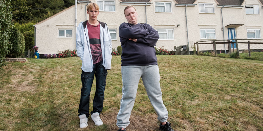 This Country. Image shows from L to R: Lee 'Kurtan' Mucklowe (Charlie Cooper), Kerry Mucklowe (Daisy May Cooper). Copyright: BBC