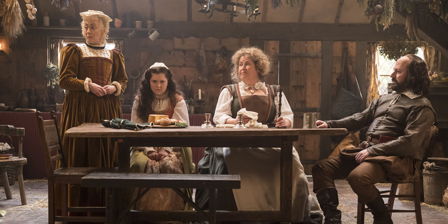 Upstart Crow. Image shows from L to R: Mary Arden (Paula Wilcox), Susanna (Helen Monks), Anne Hathaway (Liza Tarbuck), Will Shakespeare (David Mitchell). Copyright: BBC